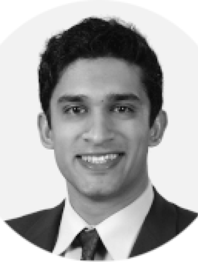 smiling student in tie