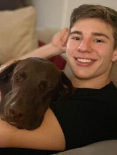 smiling student with dog